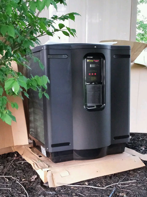 Edgar Electric set this pool heater to check placement in preparation for installing the wiring for the new heater installation. Electrical power panel updating